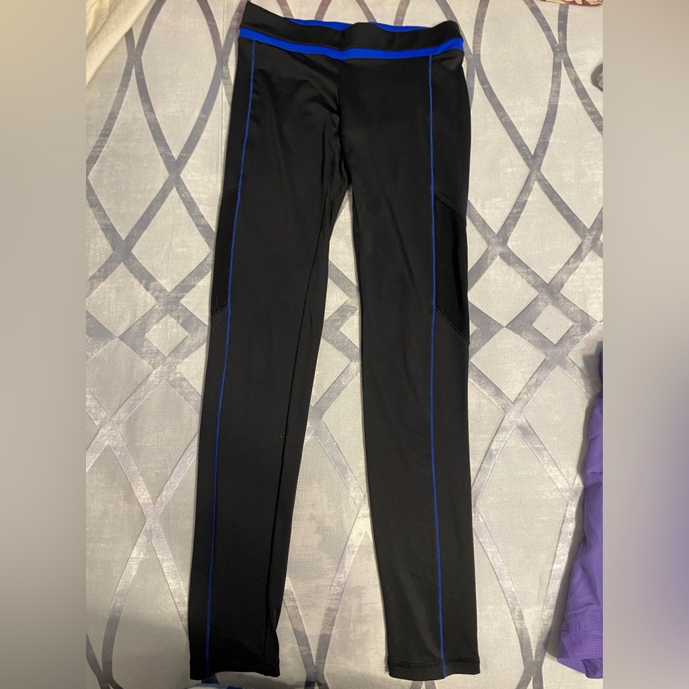 Size small, black leggings with blue stripe